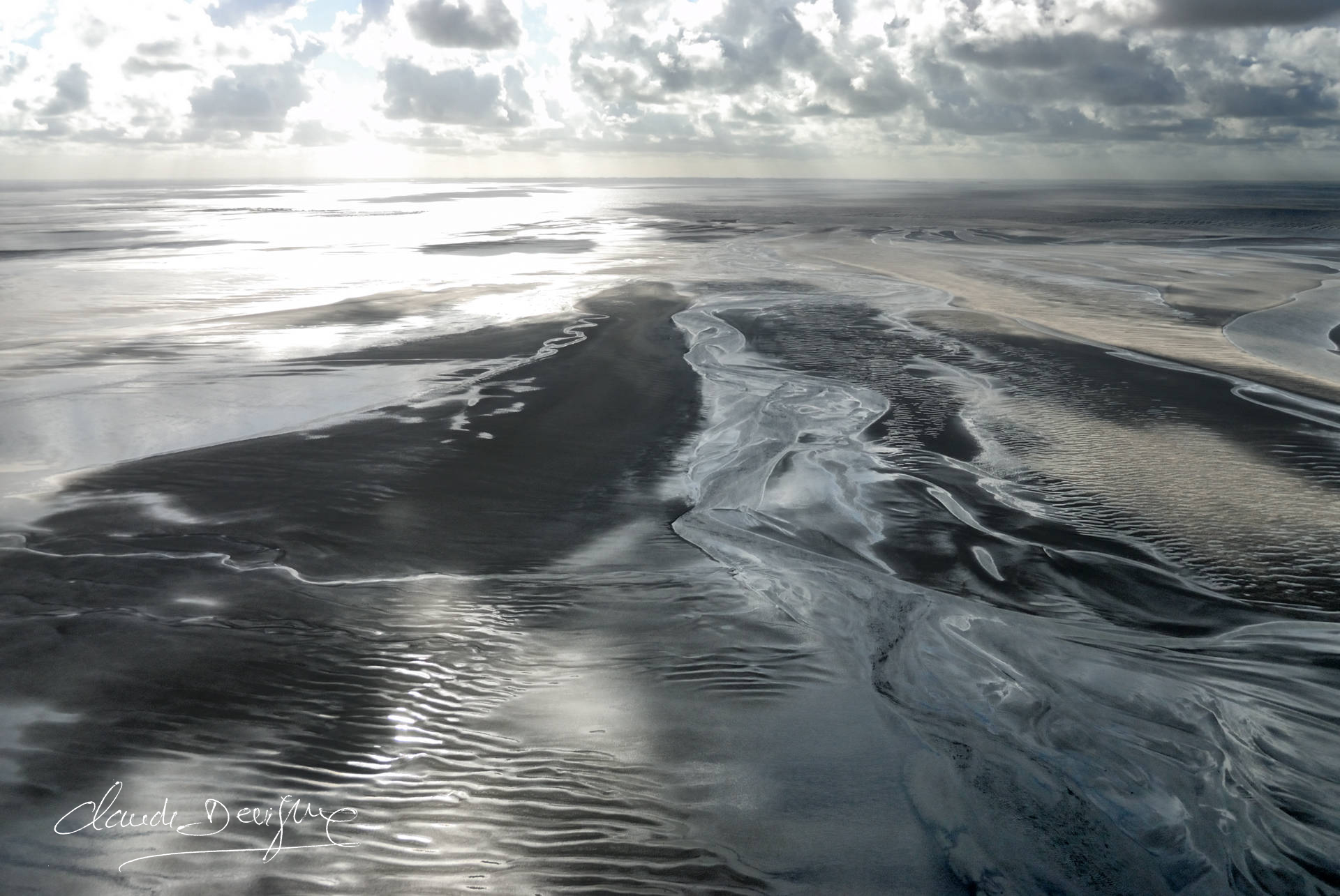 Survol dela baie du Mont-St-Michel